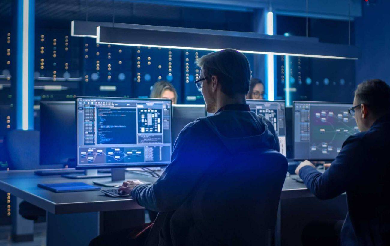 Cybersecurity professional looking for high-paying jobs in 2025 with digital security symbols and city background.